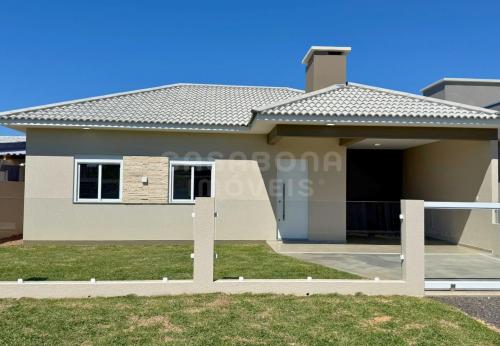 Casa nova com suíte a poucos metros do mar em Arroio do Sal